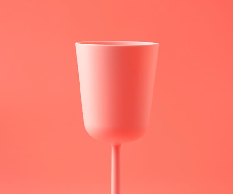 Red cup on a pink background